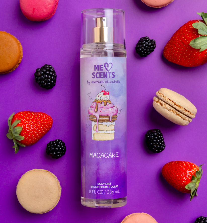 The Macacake Body Mist displayed alongside its key notes of strawberries, raspberries, and macaroons.